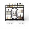 Art by Amapola modern black metal bar cart with tiered shelving, wine glass holders, and oval design detail.