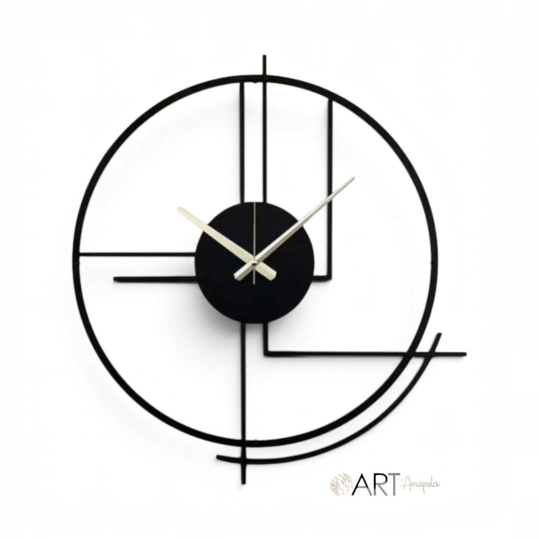 Reloj de pared Art by Amapola con diseño geométrico minimalista en color negro mate y manecillas metálicas finas.