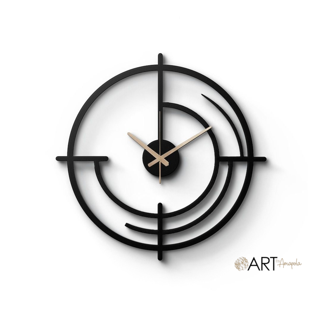 Reloj de pared Art by Amapola con diseño geométrico minimalista en negro mate y manecillas de madera natural.